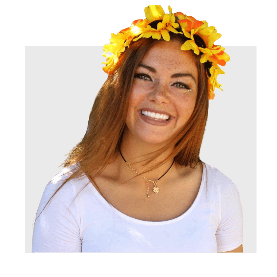 Arielle McCarthy smiling with a sunflower headband
