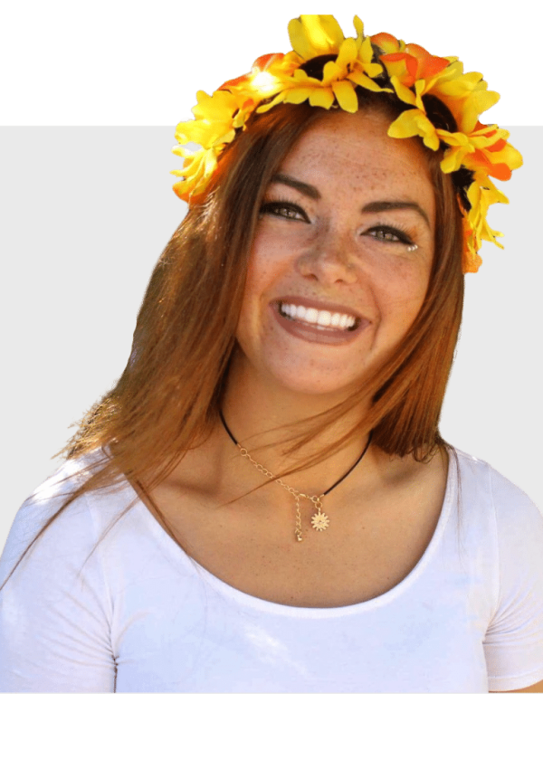 Arielle McCarthy smiling with a sunflower headband